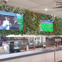 Artificial Green Walls with multi-TV screens in Sports Bar... poplet image 1