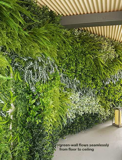 Artificial Green Walls installed over mixture of surfaces & angles to create a seamless flow...