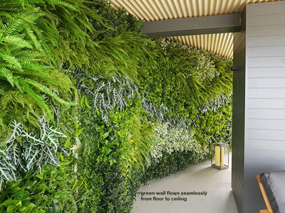 Artificial Green Walls installed over mixture of surfaces & angles to create a seamless flow...