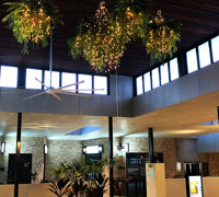 Lush green & dazzling lights- huge artificial hanging-baskets in shopping centre