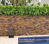 Artificial Green Wall finishes off pool side stone-wall...
