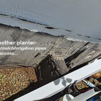 Outdoor raised planter boxes- maintenance problem solved by UV-treated artificials! poplet image 5