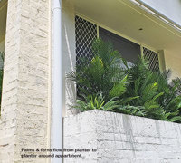 Outdoor raised planter boxes- maintenance problem solved by UV-treated artificials!