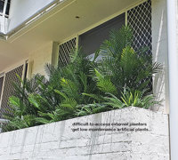 Outdoor raised planter boxes- maintenance problem solved by UV-treated artificials!