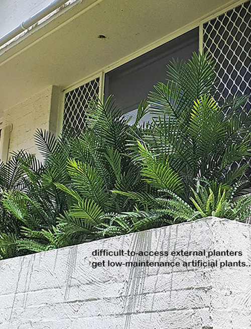 Outdoor raised planter boxes- maintenance problem solved by UV-treated artificials!