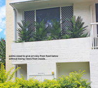 Outdoor raised planter boxes- maintenance problem solved by UV-treated artificials!