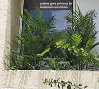 Outdoor raised planter boxes- maintenance problem solved by UV-treated artificials!
