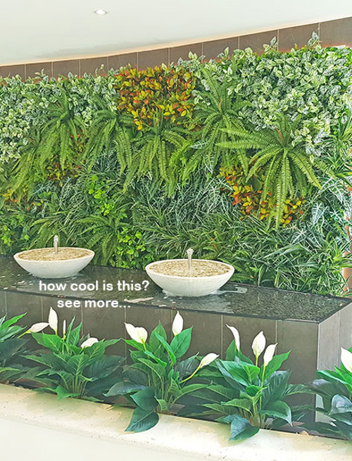 artificial plants are solution for tranquil Foyer Fountain setting...