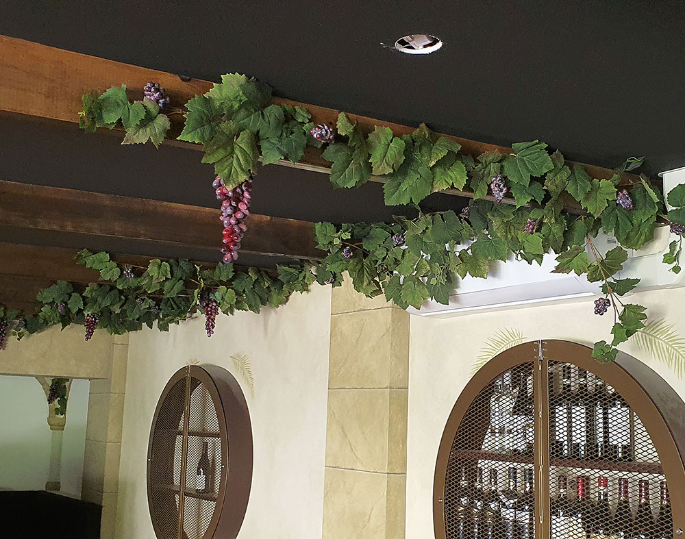 grape-vines enhance Italian Restaurant theme