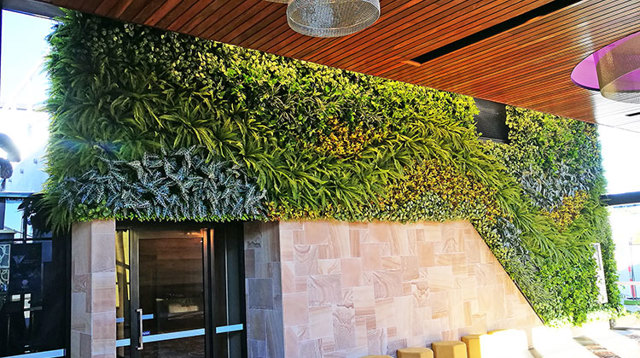 Green-Wall flows seamlessly from outdoors into club foyer