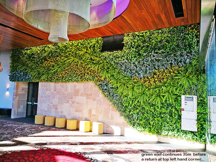 Artificial Green Wall flows seamlessly from outdoors into club foyer image 4
