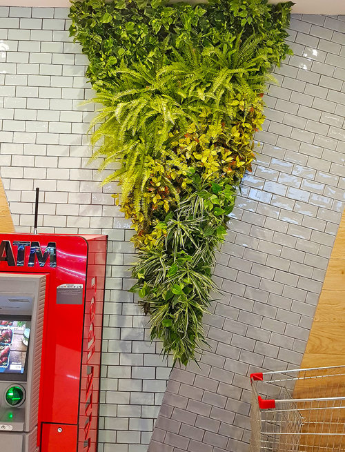 Custom-sized to fit architecture, artificial green-walls are cool!