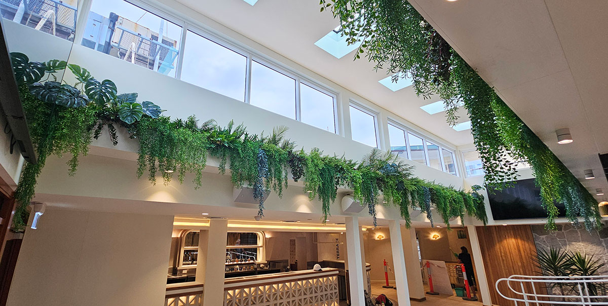 a hanging garden of lush, UV-rated plants