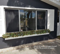UV-treated artificial plants dress-up commercial building facade...