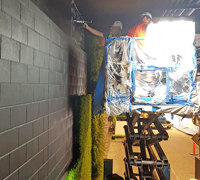 Artificial Green Walls turn concrete canyon into a porte cochere