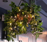 Hanging-Baskets with lights brighten up marina restaurant...