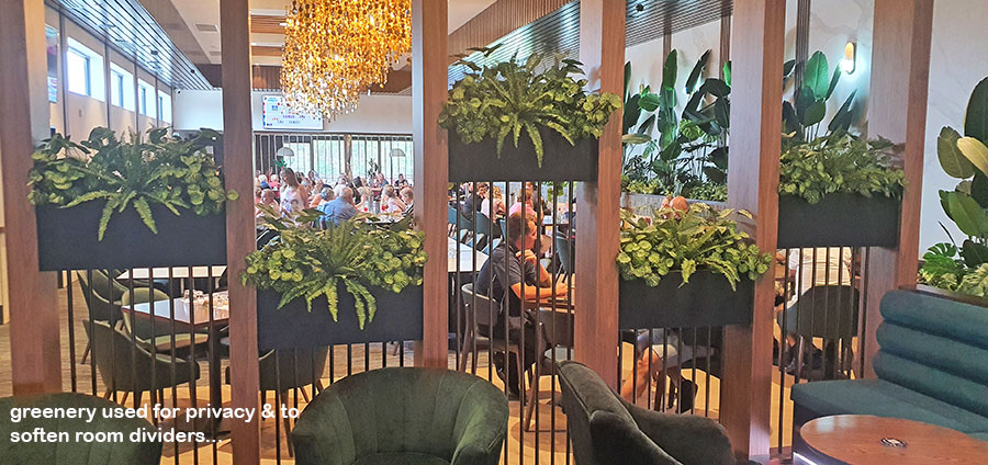 New extensions at large Club feature lush greenery...