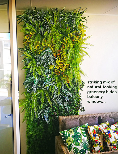 Artificial Green Wall to hide an unwanted balcony window...