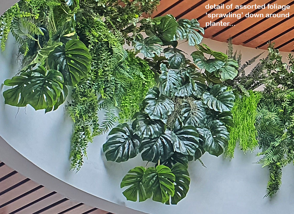 Impressive Tavern Refurb using Artificial Greenery overhead effectively...