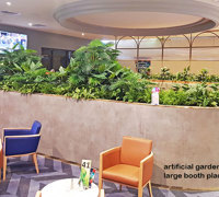 Football Clubhouse uses artificial greenery to set-off beautiful custom-built planters