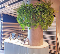 Football Clubhouse uses artificial greenery to set-off beautiful custom-built planters