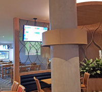 Football Clubhouse uses artificial greenery to set-off beautiful custom-built planters