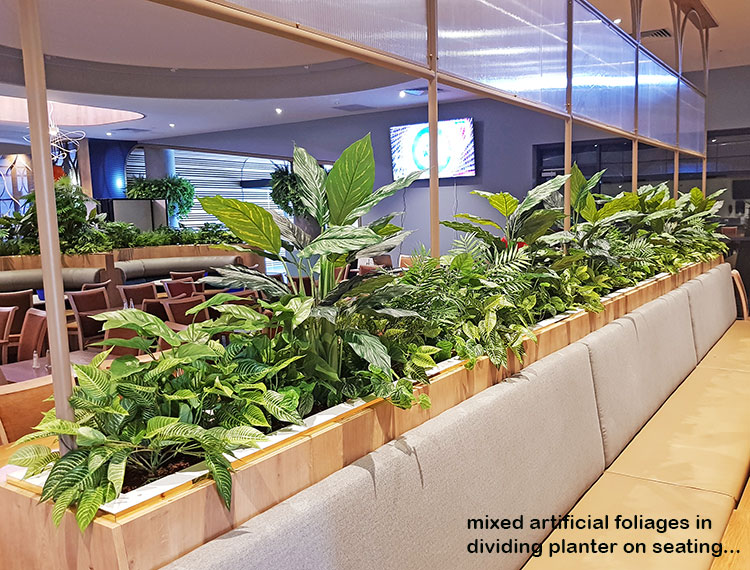 Football Clubhouse uses artificial greenery to set-off beautiful custom-built planters