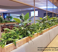 Football Clubhouse uses artificial greenery to set-off beautiful custom-built planters