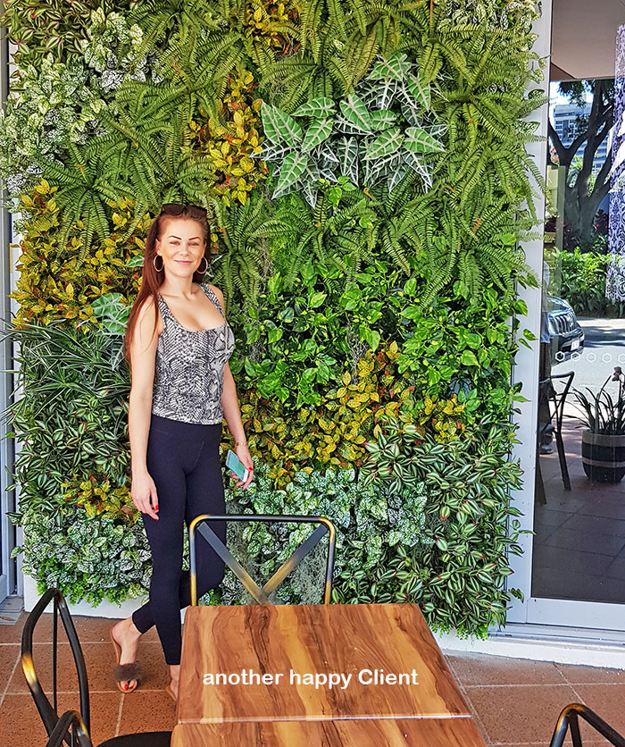Hiding an ugly downpipe using artificial Green-Walls