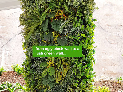 Ugly block support walls turned into lush green-screens with artificial plants