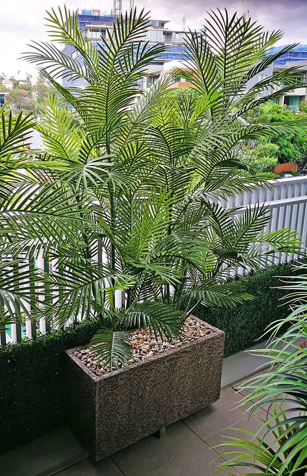 Green balcony privacy screen with UV-treated palms image 3