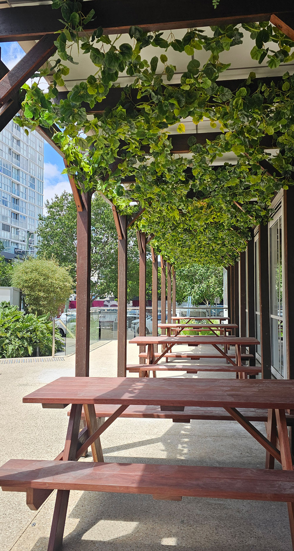 Pergola softened with artificial vines