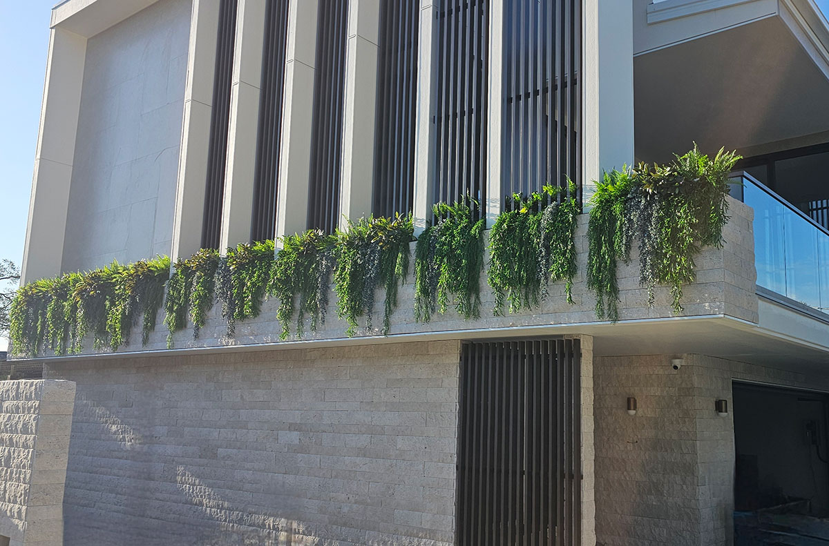 Outdoor trailing greenery for modern apartments.