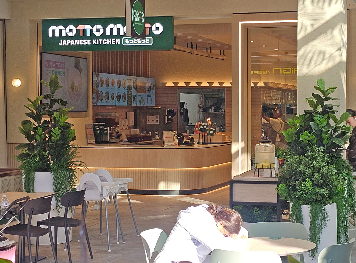 Large potted artificial greenery for alfresco dining